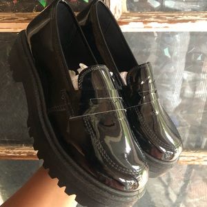 Black platform loafers